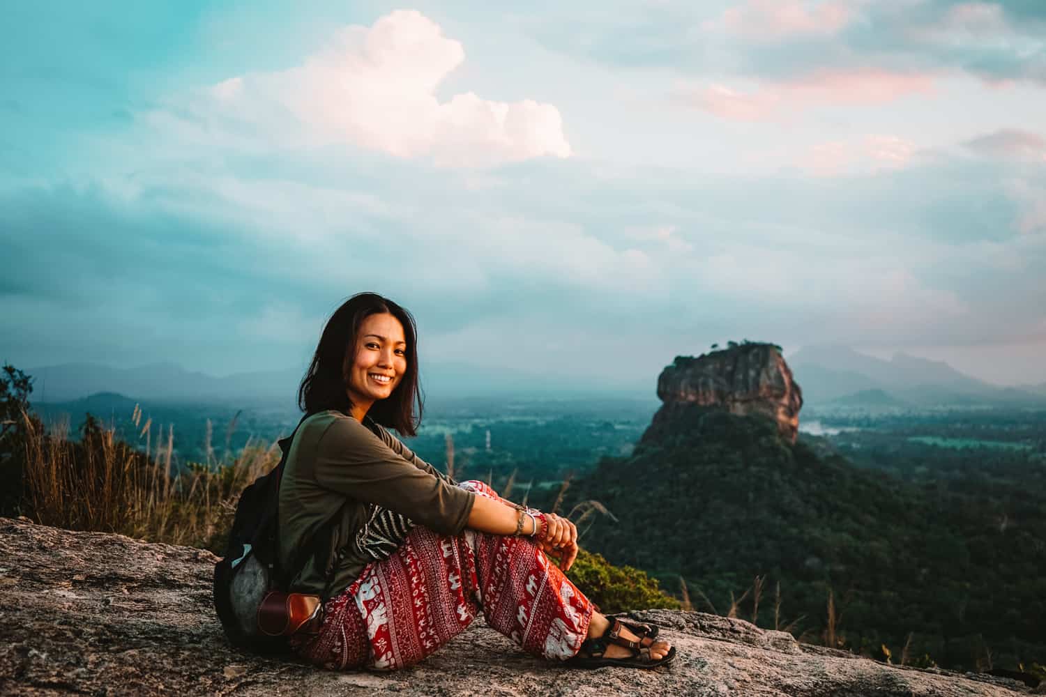 Sigiriya Lion Rock fortress rising above jungle canopy Sri Lanka